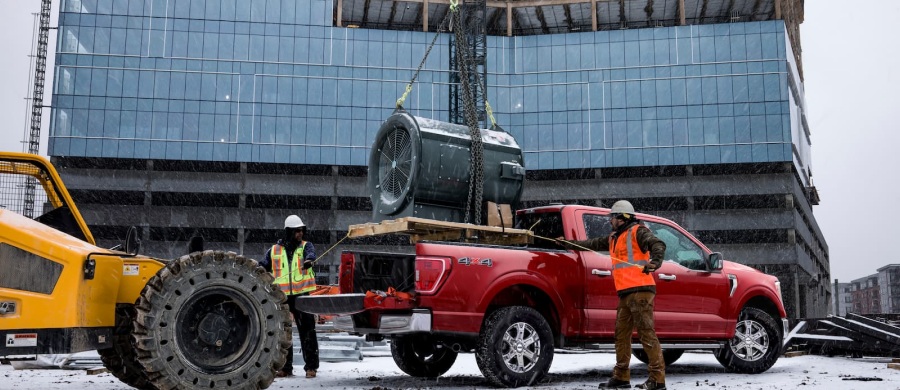 Ford certified technicians working on a truck at a job site
