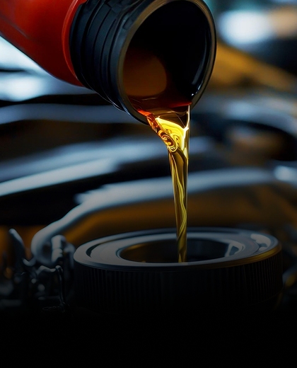 Fresh oil being poured during an oil change